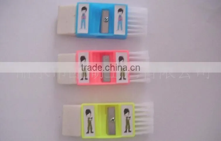 Plastic sharpener with eraser and brush
