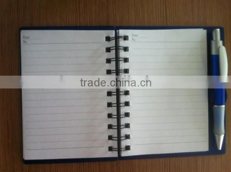 Red color pp sprial notebook with pen