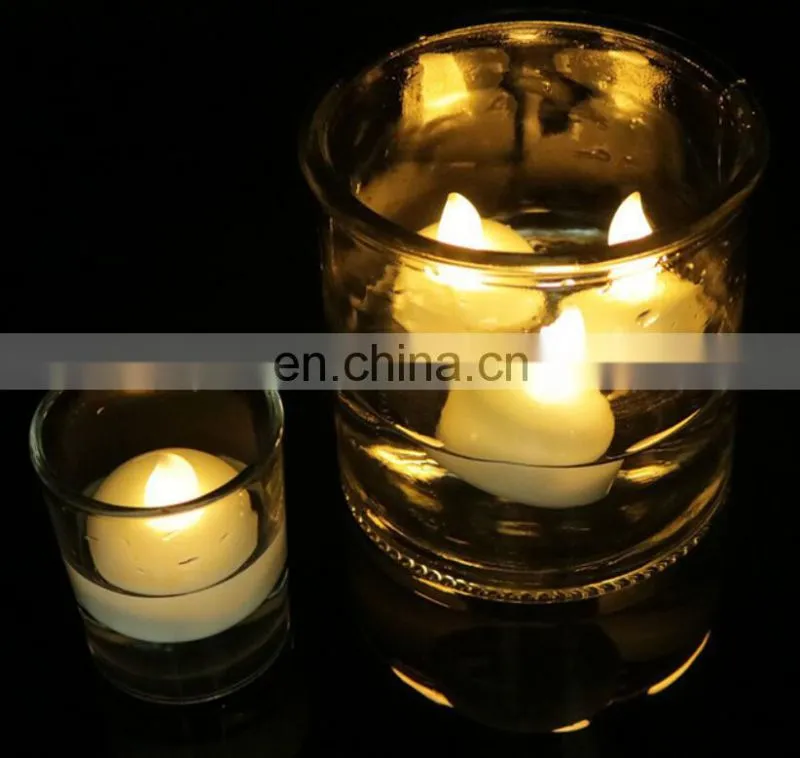 12 pieces per pack waterproof battery operated glitter candle light color changing floating led candle with swirling glitter