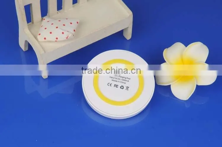 Cute around hot selling cheapest QI wireless charger pad for universal smart phone