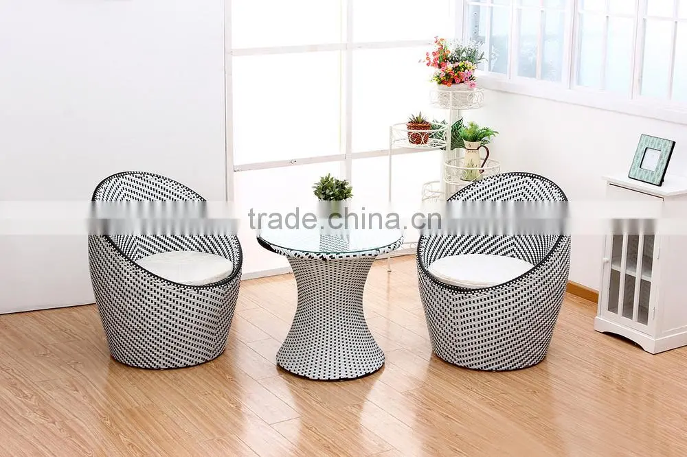 modernism rattan set tempered glass table two rattan egg chairs
