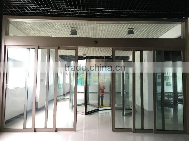 Telescopic automatic sliding glass doors operator