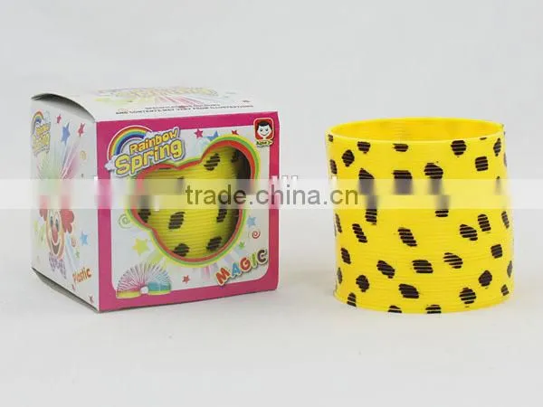 wholesale good quality plastic rainbow spring with smile face/magic rainbow circle