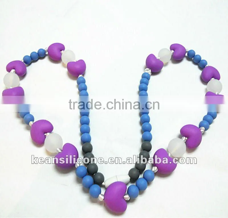 Salmon Orange Chew Silicone Teething Necklaces have a breakaway clasp Make by Food Grade Silicone