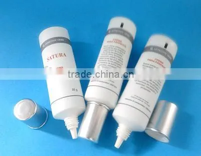 Cosmetic tube with silicone valve flip top