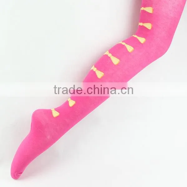 Girl dancing tights pantyhose in pink colored with nice bowknot