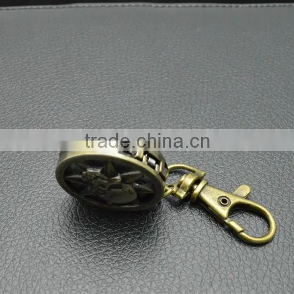 Sun god pocked watch with key chain