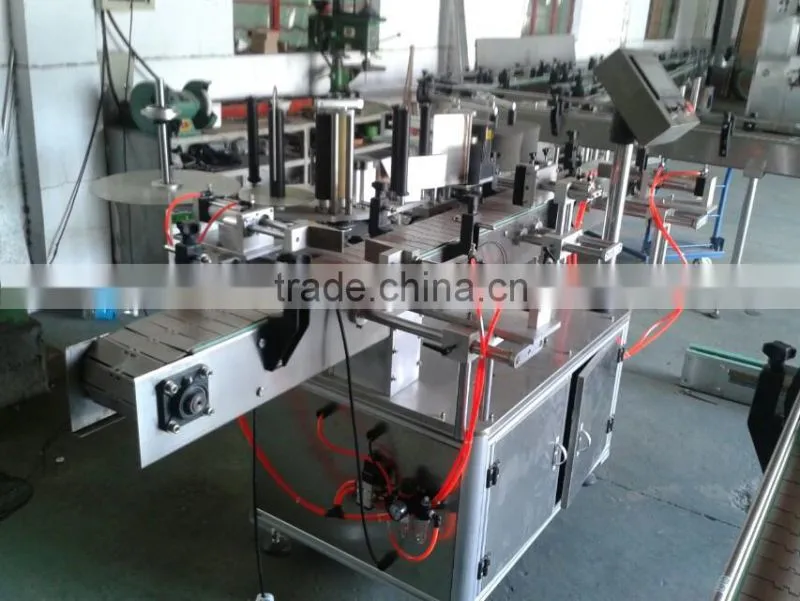 Automatic self-adhesive bottle labeling machine