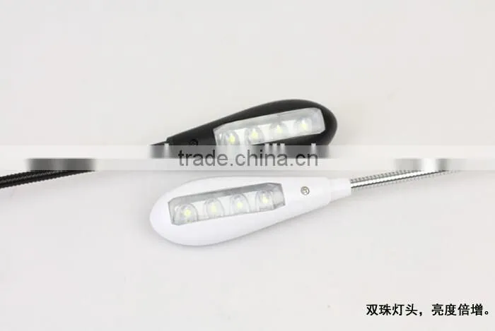 Extra-Bright 4 LED Book Reading Light Easy Clip 2 Brightness Settings, Soft Padded Clamp. Perfect for Bookworms