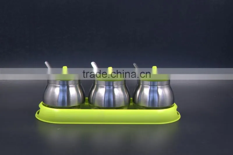 glass spice jar set on plastic base