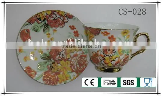 flower tea cup and saucer with gold rim