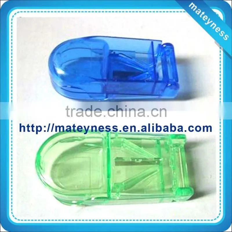 Pill box with cutter