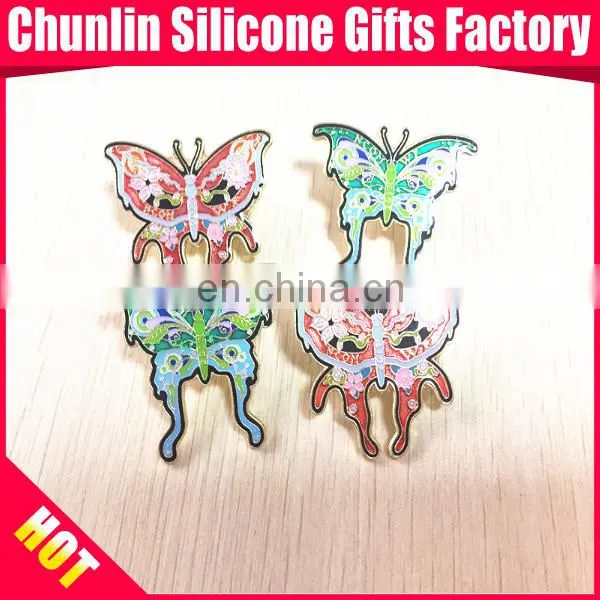 carved lapel pin with resin