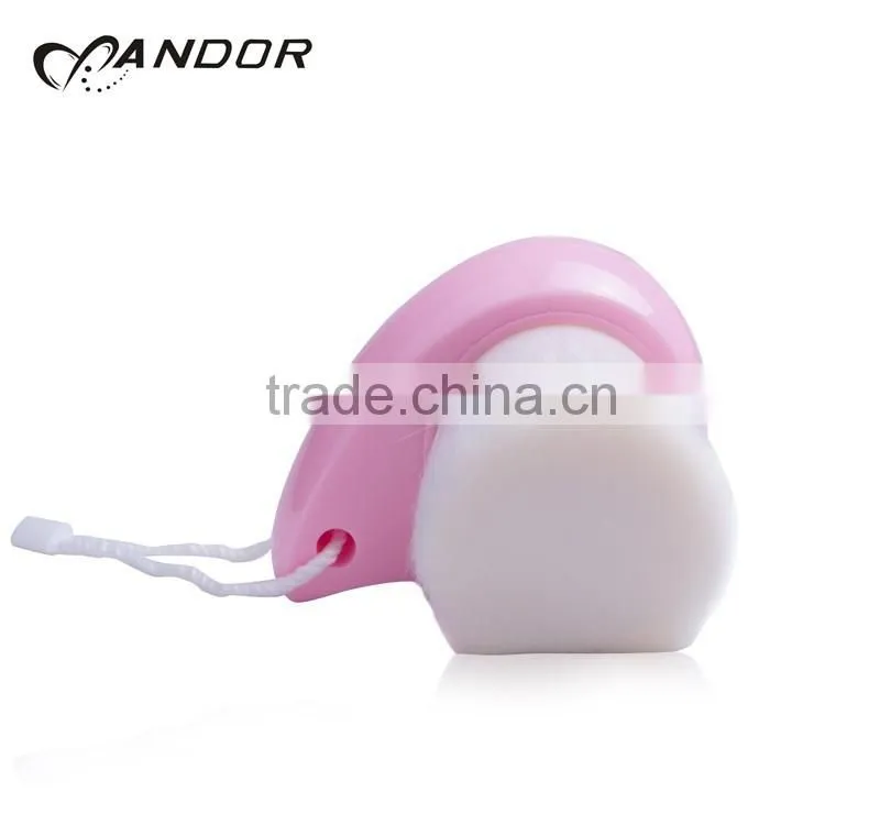 Patent design pink handle andor face cleansing brush