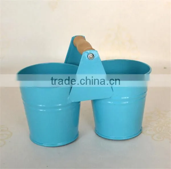 Small colored metal split pot planter