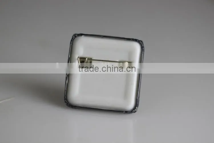 VOGRACE fancy square tin badge with full colour