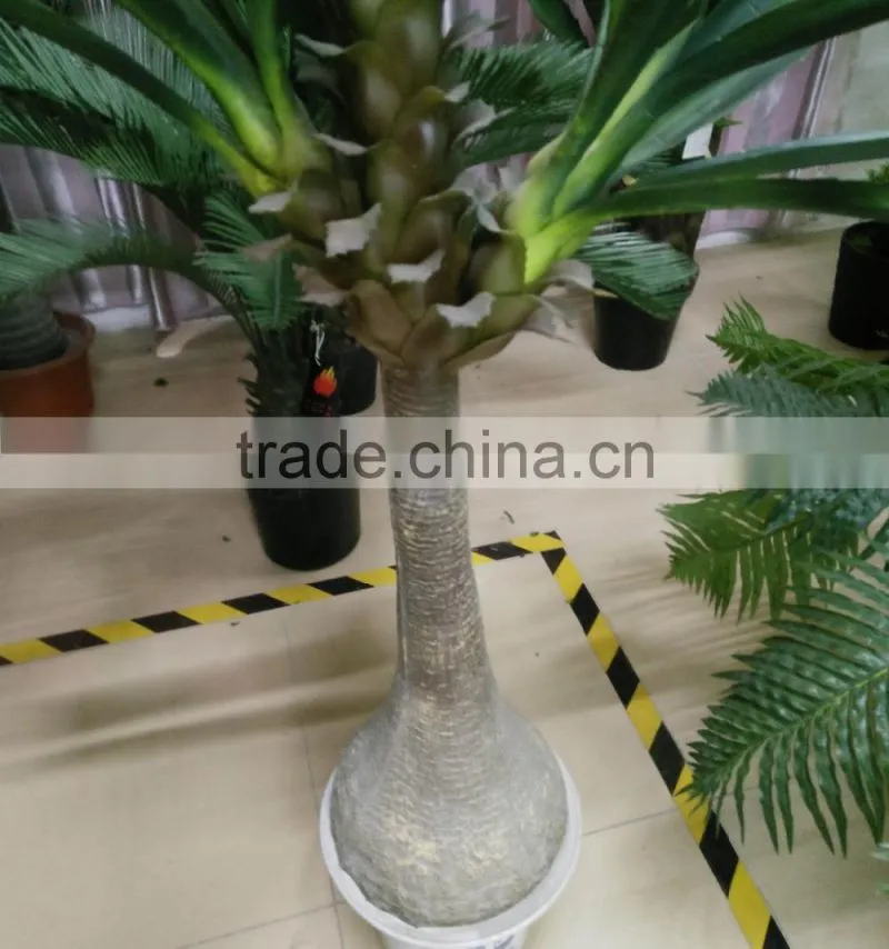 artificial green plant with flower for decoration