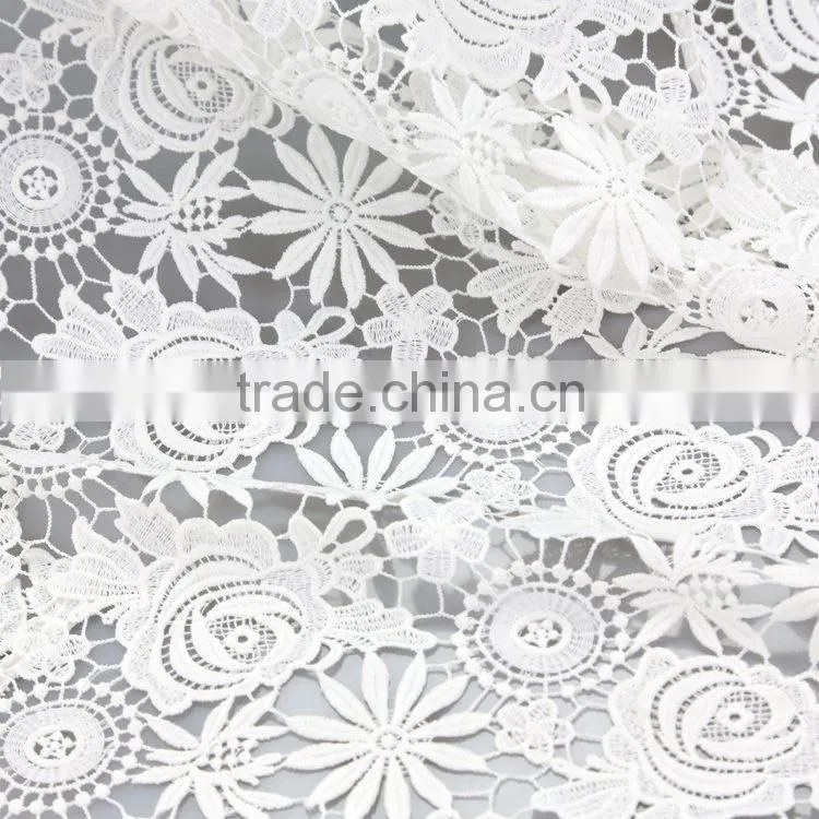 OEM/ODM Manufactur simple and elegant embroidered fabric with cutwork embroidery for wedding dress