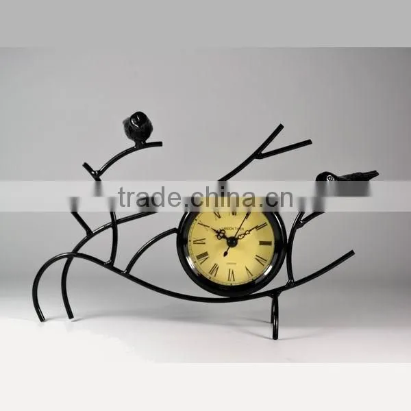 Metal table clock with birds