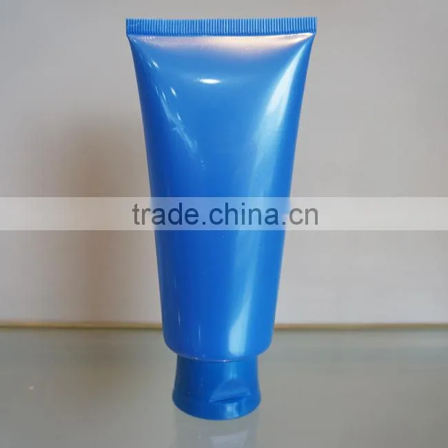 plastic tube with oriented flip-top cap