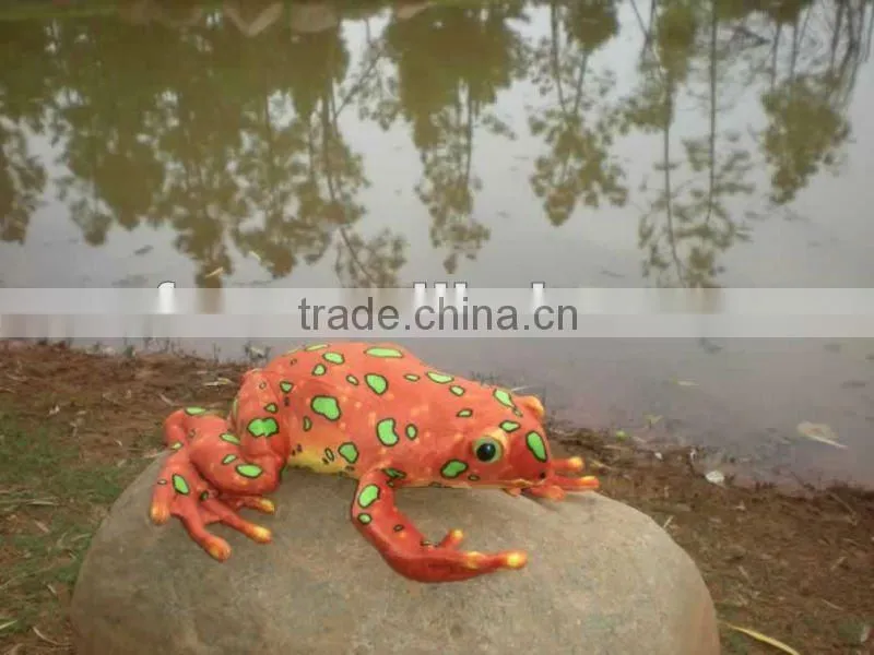 Realistic plush toy frog with spots