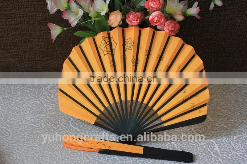 Chinese folding hand fan with black bamboo ribs
