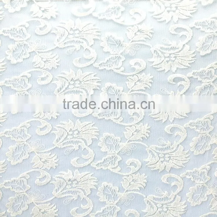 2015 New design hot sale white transparent mesh lace embroidered tulle fabric for wedding dress
