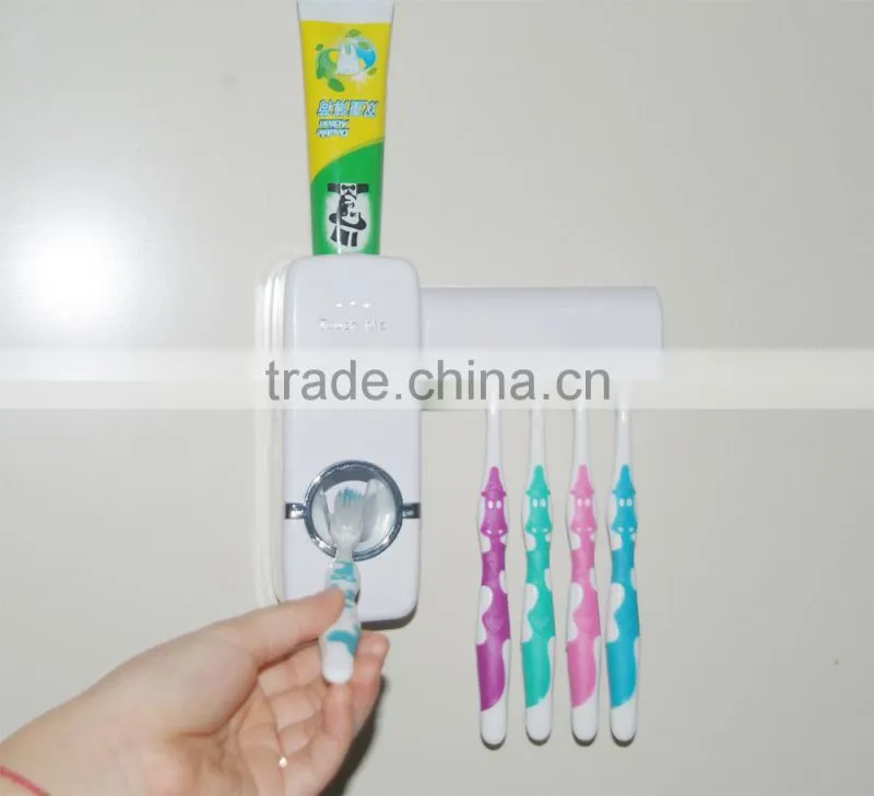 Wholesale children automatic toothpast dispenser toothbrush that dispenses with brush holder bathroom set