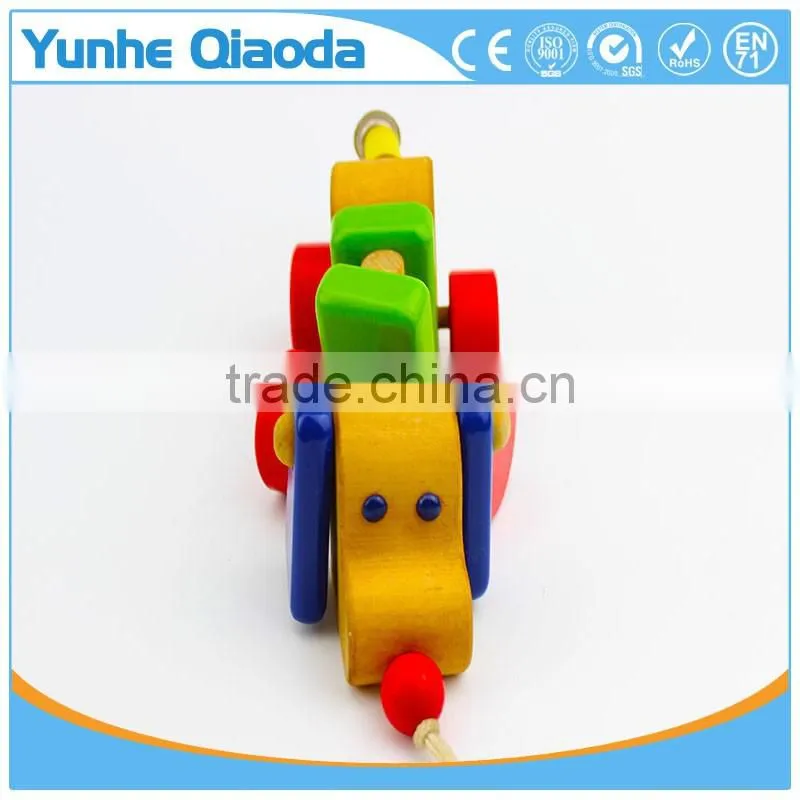 colorful Pull Along wiggles Dog Wooden Toy wiggles as you pull they make a clicking sound and make a fun baby