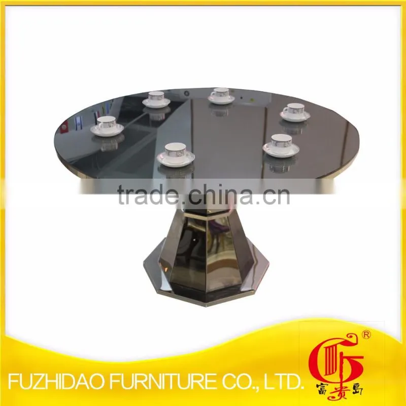 Upholstered stainless steel goldedn glass surface table for sale