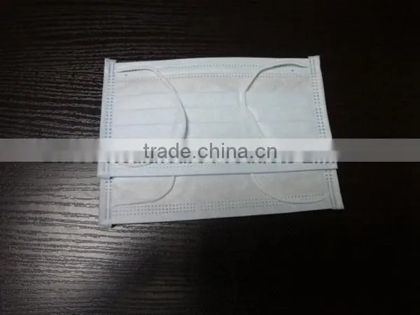 Nonwoven face mask