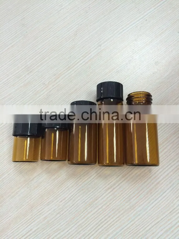 different size transparent and amber colored glass bottles with cap sale