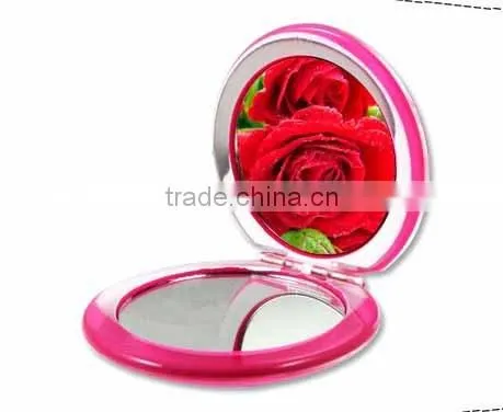 . Double sided round pocket makeup mirror