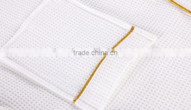 White waffle bathrobe for hotel / home