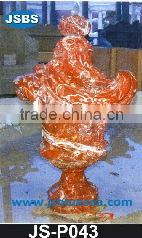 Golden marble planter with man head