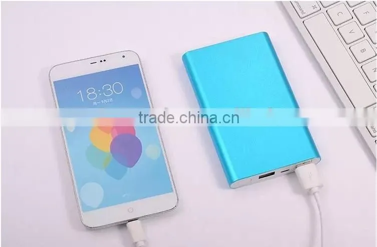 Slim design 10000mAh dual usb output mobile phone power bank charger with custom laser engraving logo and gift box package