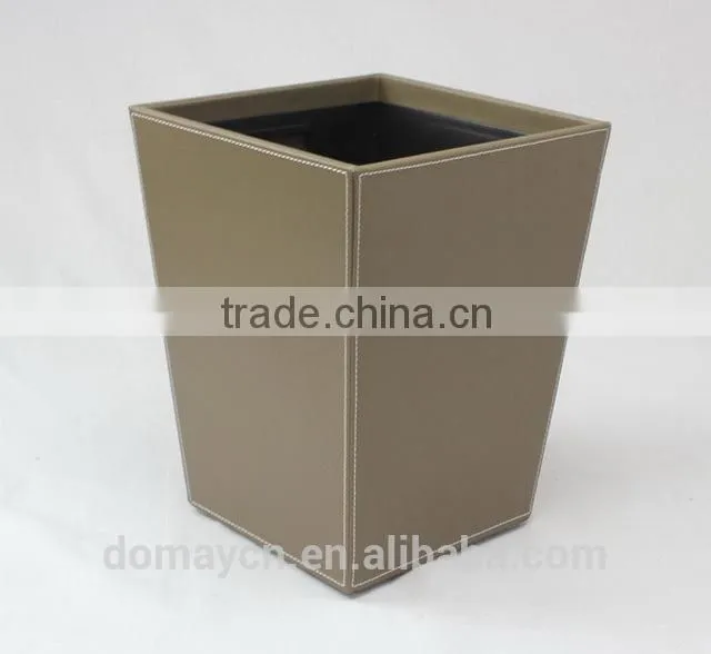Faux leather waste bin with metal insert