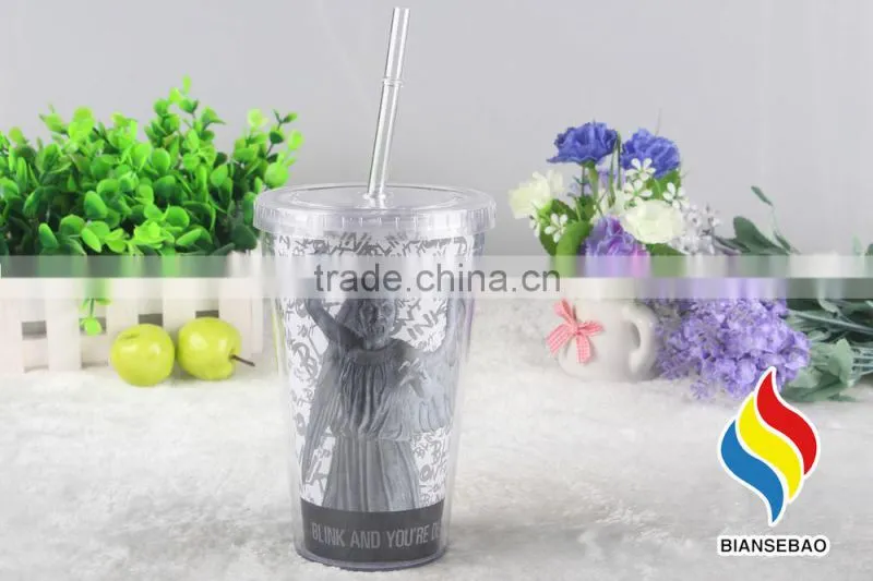 Double wall 16 oz plastic tumbler with paper insert for beverage