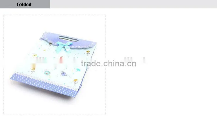 blue button closure fancy wedding flavour paper gift bag