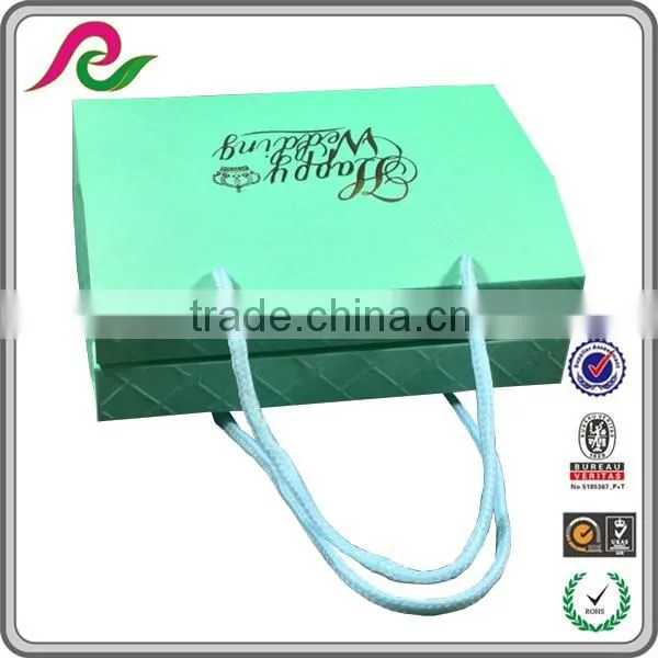 Folding paper box with handle with logo foil