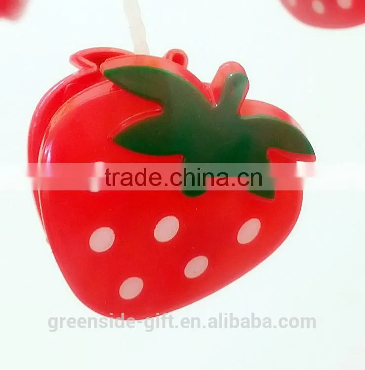 Durable plastic sock hanger with cartoon strawberry pegs