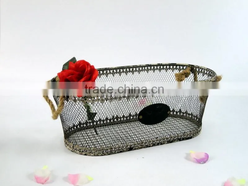 Shabby and chic decorative metal basket with wicker hanging