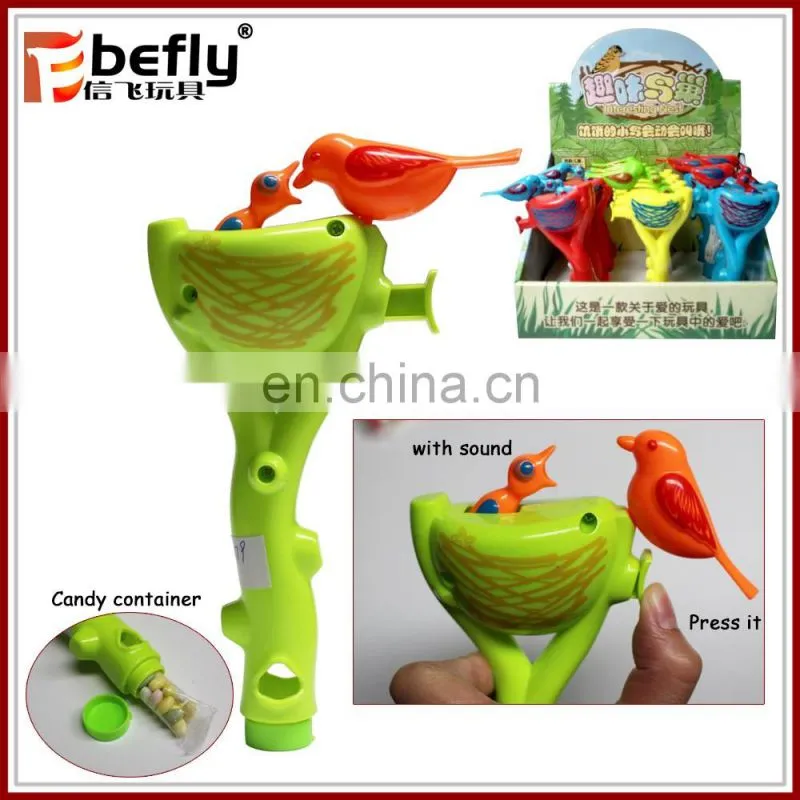 Plastic shaking noise rattle toy with candy
