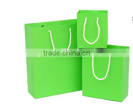 Green bright paper handmade handbag of gift box