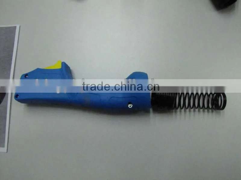 TBI welding torch handle with spring