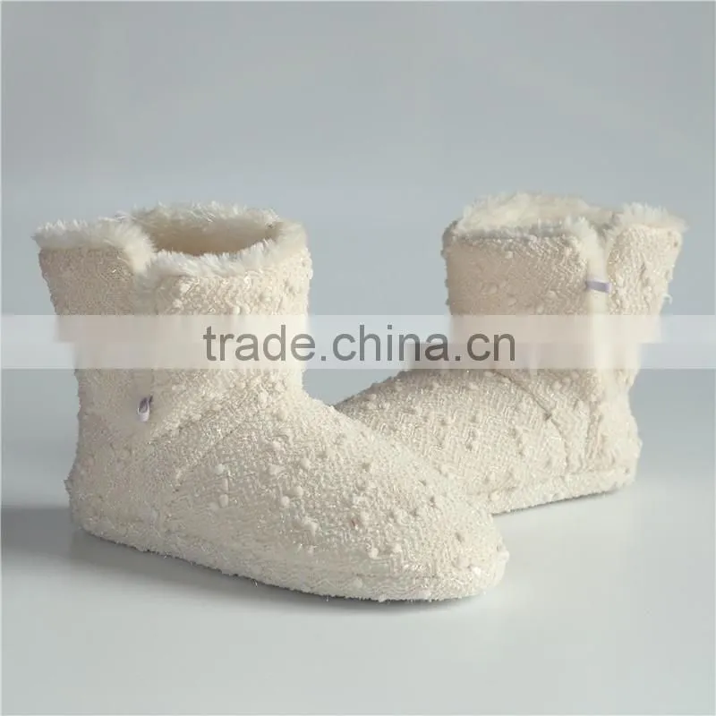 Ladies slipper boots with button