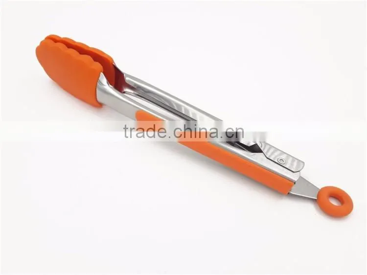Stainless steel tongs with standing feet