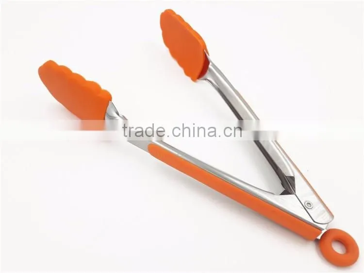 Stainless steel tongs with standing feet