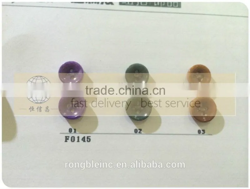 White color natural corozo button with 4 holes