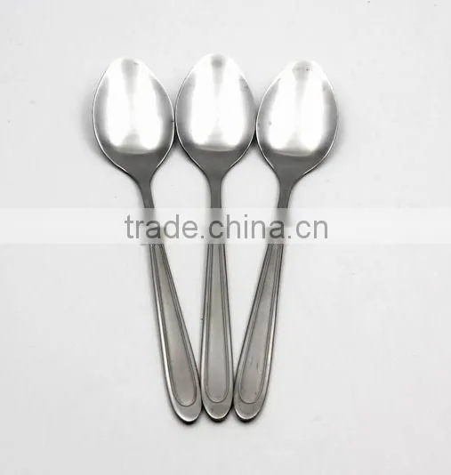 Modern stainless steel cocktail spoon in the bar